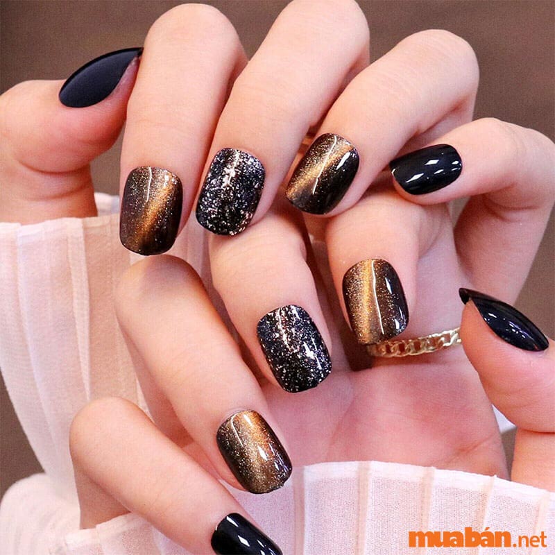 Mẫu nail mắt mèo đen sang trọng cho ngày Tết