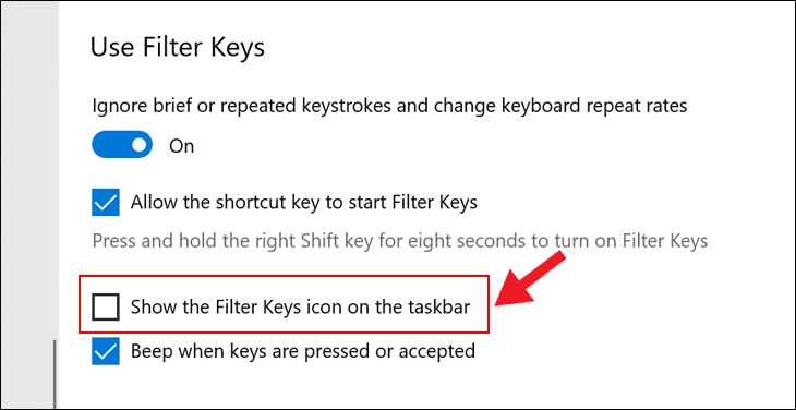 Trượt xuống ở ô Show the Filter keys icon on the taskbar chuyển sang trạng thái không hiển thị dấu tích