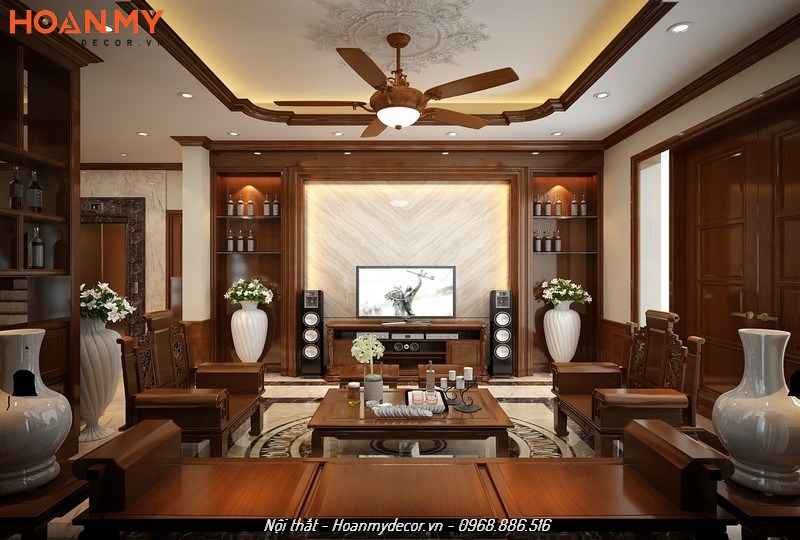 Thi công nội thất phòng khách theo phong cách tân cổ điển gỗ tự nhiên kết hợp 2 chậu lục bình đối xứng sang trọng, tinh tế
