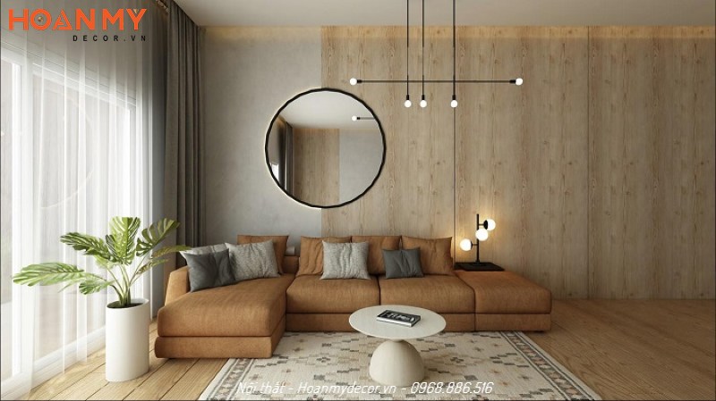 Trang trí phòng khách đơn giản với đèn thả độc đáo và gương tròn tạo sự rộng mở cho không gian